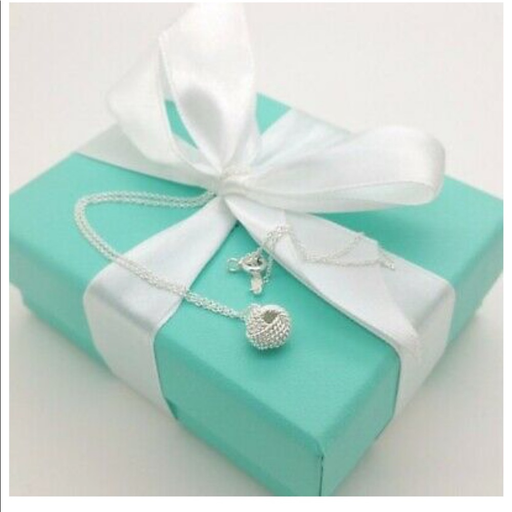 Tiffany & Co sterling silver 925 knot Pendant 16”